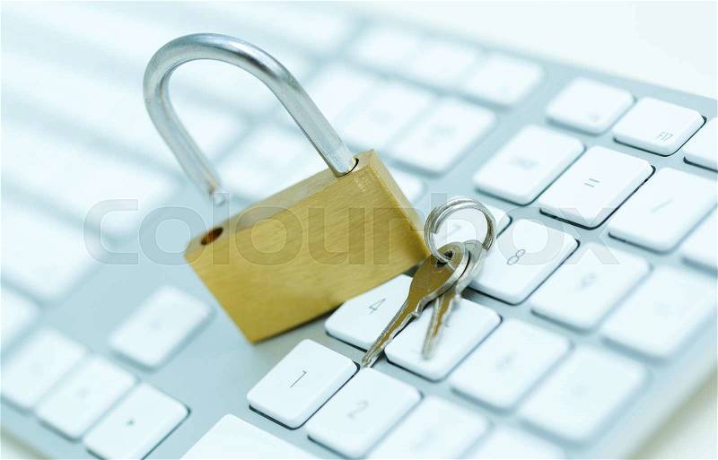Security lock on white computer keyboard - computer security breach concept, stock photo