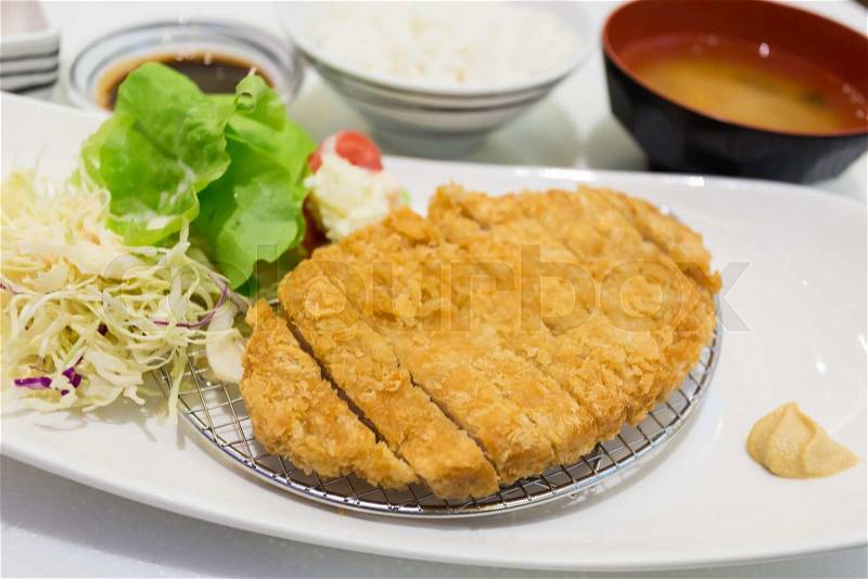 Tonkatsu - Japanese breaded deep fried pork cutlet with steamed rice and miso soup, stock photo