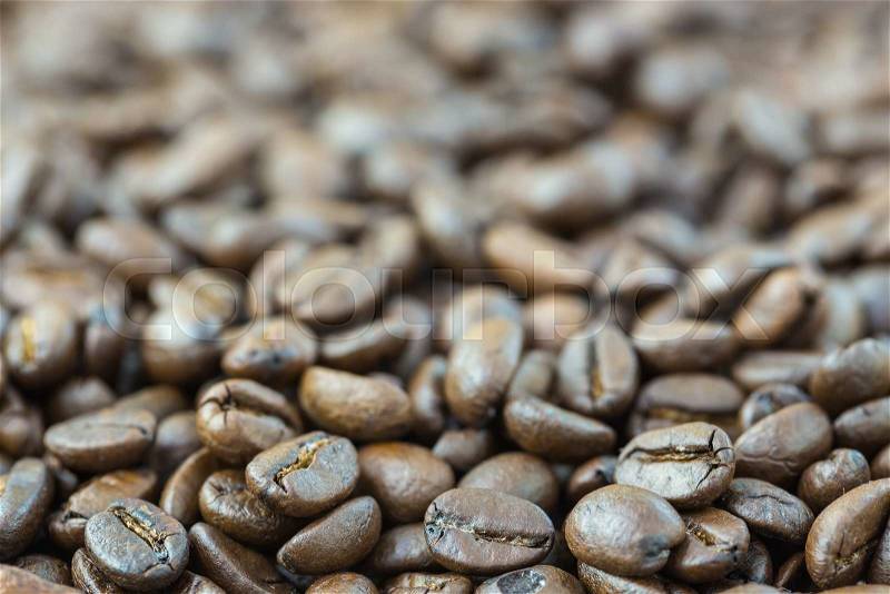 Roasted coffee seed for fresh coffee background, stock photo