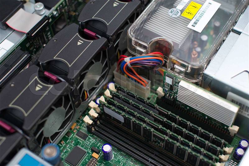 Inside of server pc. Motherboard, cooler fans and RAM memory, stock photo