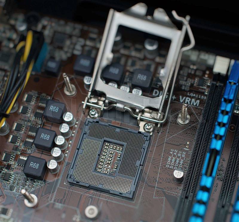 Inside of pc. Motherboard, CPU socket and RAM memory, stock photo