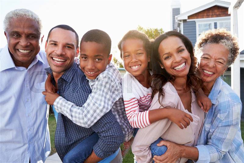Outdoor group portrait of black multi generation family, stock photo