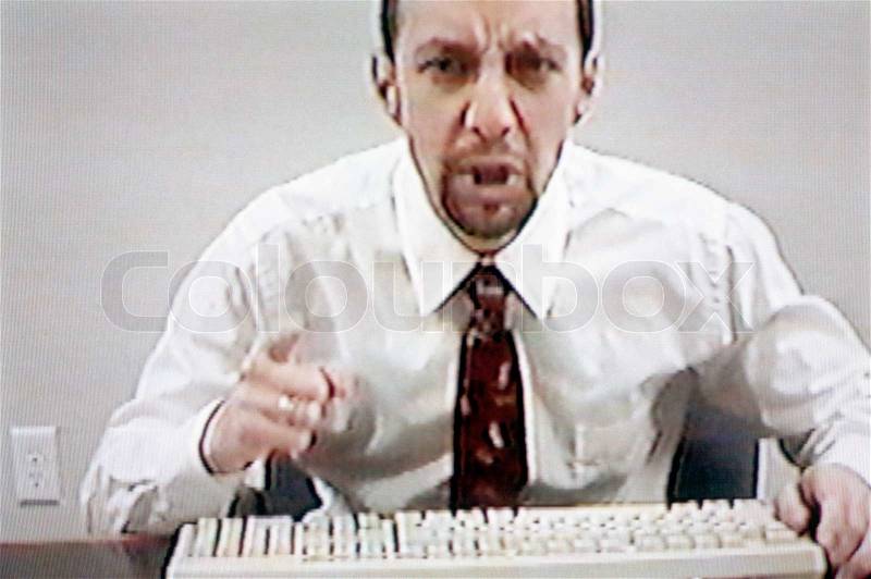 Video still of angry businessman teleconferencing, concept photography, model released, stock photo