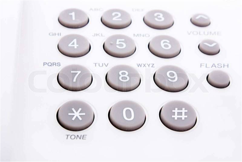 Close up shot of grey and white phone keypad, stock photo