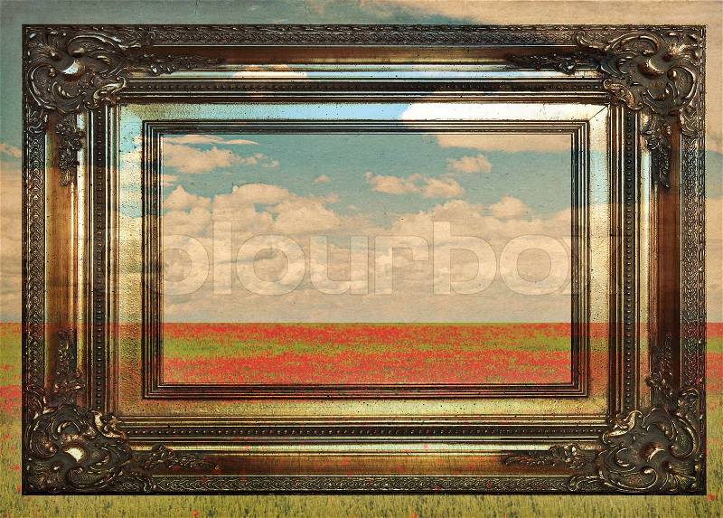 Field of poppies. vintage picture in old golden frame, stock photo