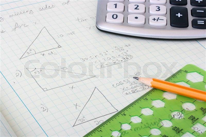 Geometrical calculations and constructions taking into account corners and other sizes in a writing-book of the student, stock photo