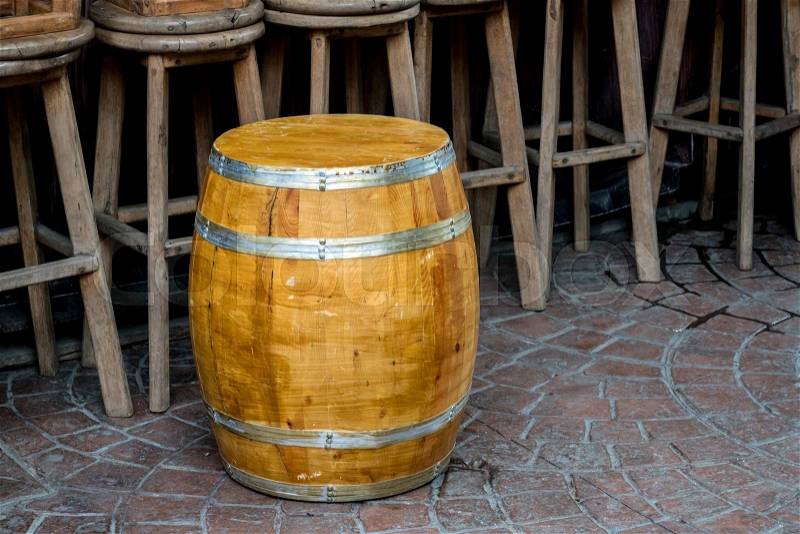 Oak wood barrel with wooden stool, stock photo
