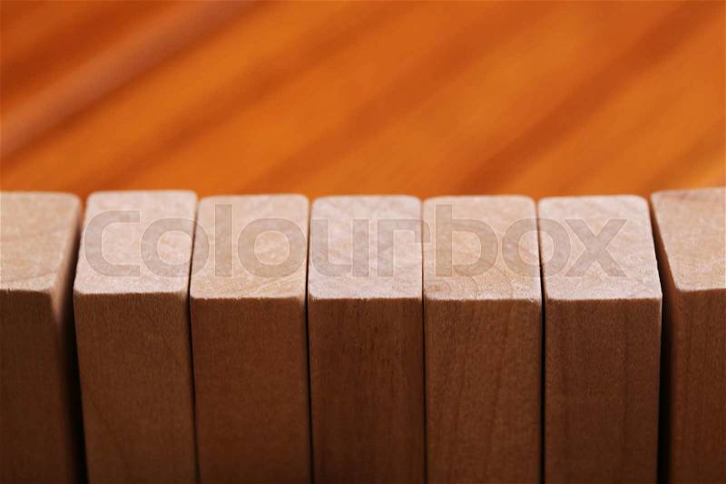 Wooden blocks are on the wooden floor background, stock photo
