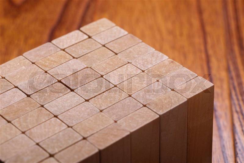 Wooden blocks are on the wooden floor background, stock photo