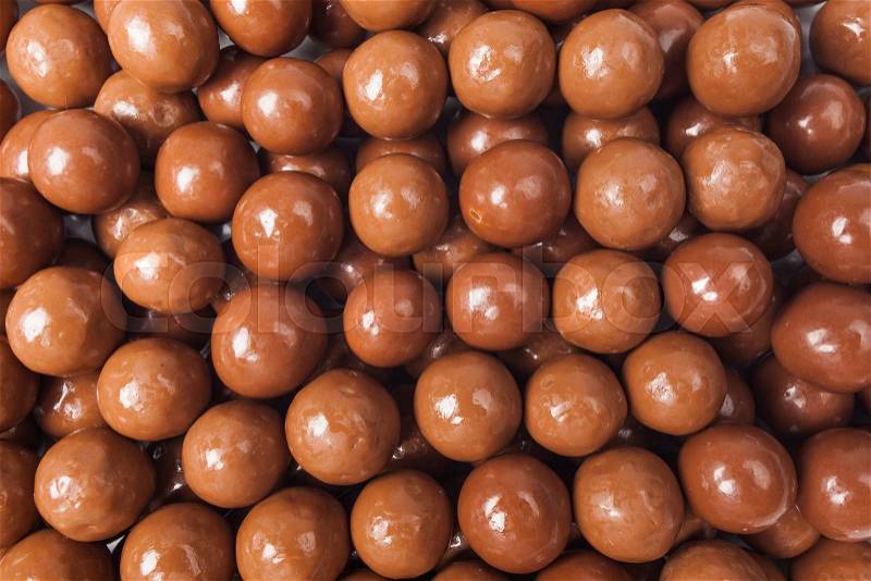 Chocolate candies background. Closeup brown chocolate candy background, stock photo