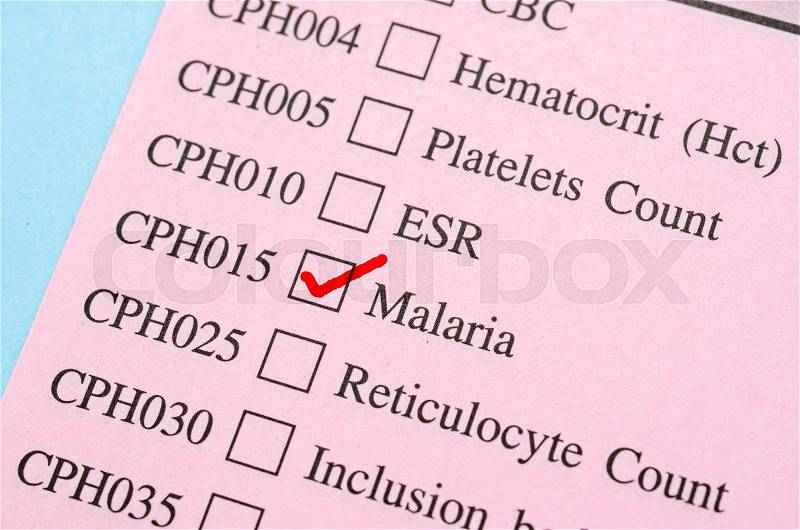 Red mark check on Malaria test form paper in laboratory, stock photo