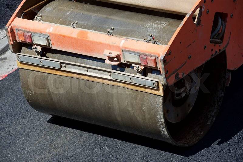 Heavy Vibration roller in asphalt pavement work, stock photo