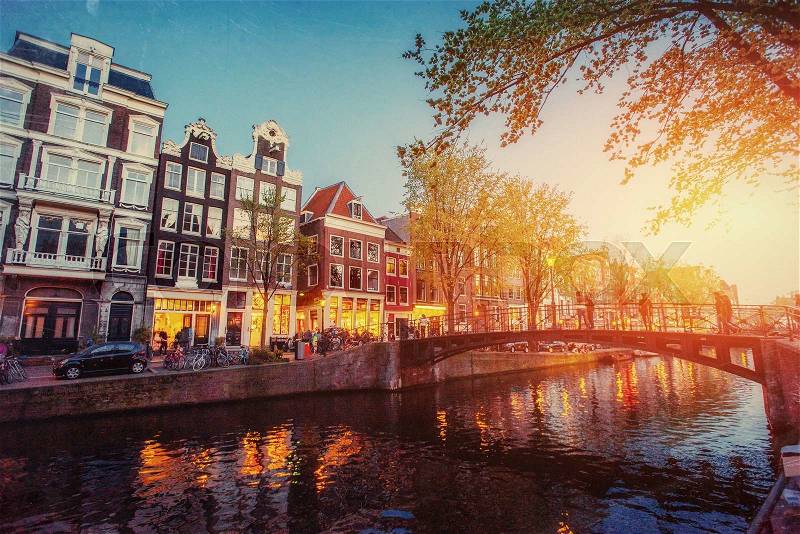 Amsterdam canal at sunset. Amsterdam is the capital and most populous city in Netherlands. , stock photo