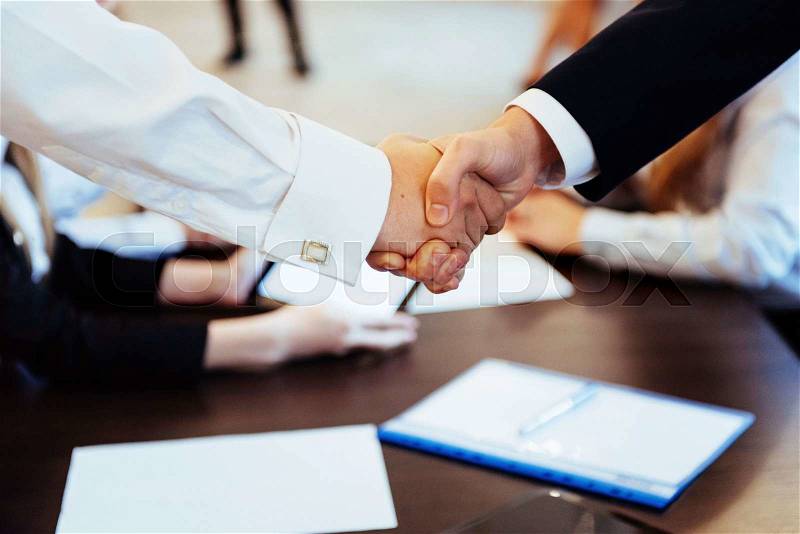 Business men hand shake, stock photo