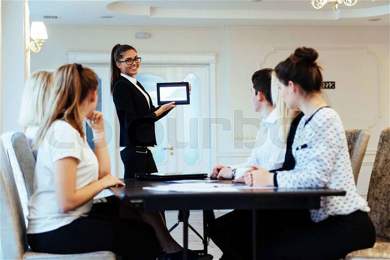 Group of students studying using a laptop, stock photo