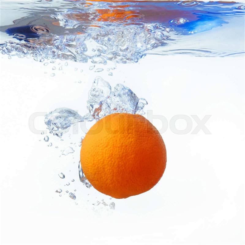 Orange in spray of water. Orange with splash on white background, stock photo