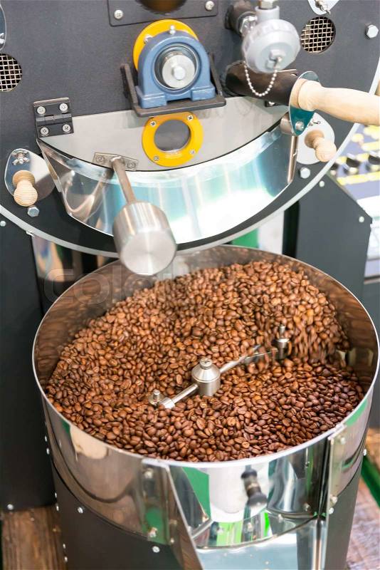 A lot of coffee beans and bag coffee machine, stock photo