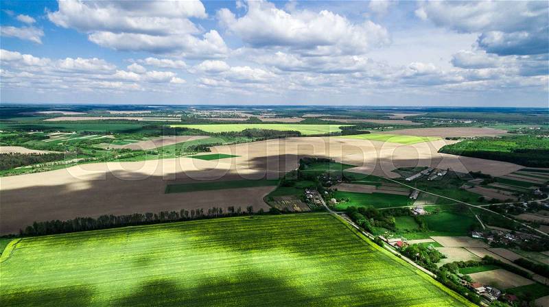 Beautiful landscape with shade of clouds on the field, aerial photo, stock photo