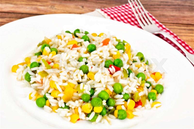 Risotto with Vegetables, Carrots and Peas. Studio Photo, stock photo