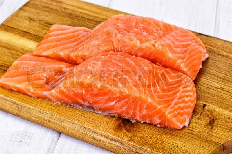 Fresh Salmon on White Plate. Studio Photo, stock photo