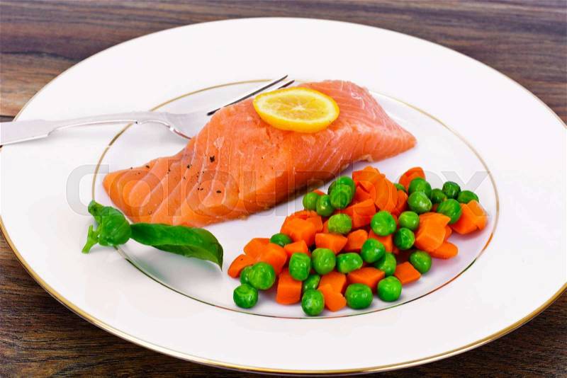 Fresh Salmon on White Plate. Studio Photo, stock photo