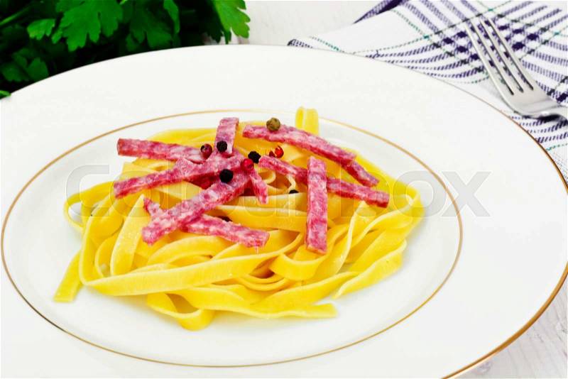 Italian Noodles, Pasta with Sausage, Salami and Ketchup Studio Photo, stock photo
