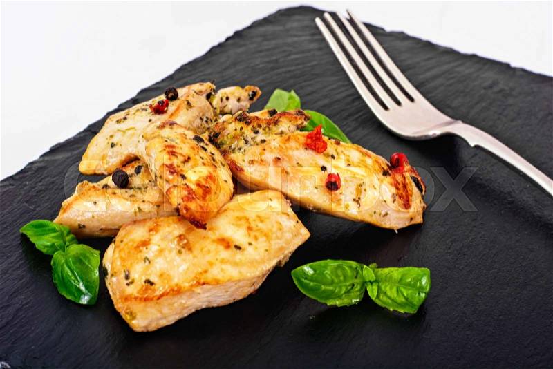 Grilled Chicken Fillet with Pepper, Basil and Tomato Studio Photo, stock photo