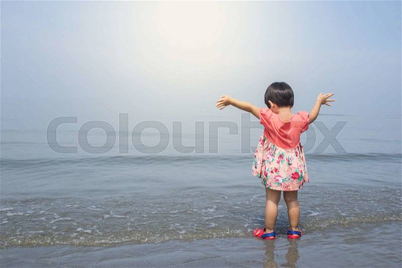The girl was glad to see the sea, stock photo