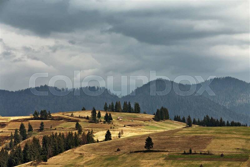 Spring rain in mountains. Thunder and clouds. , stock photo