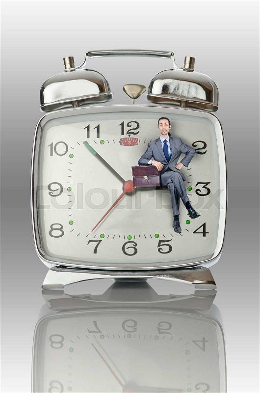 Business concept with businessman and clock, stock photo