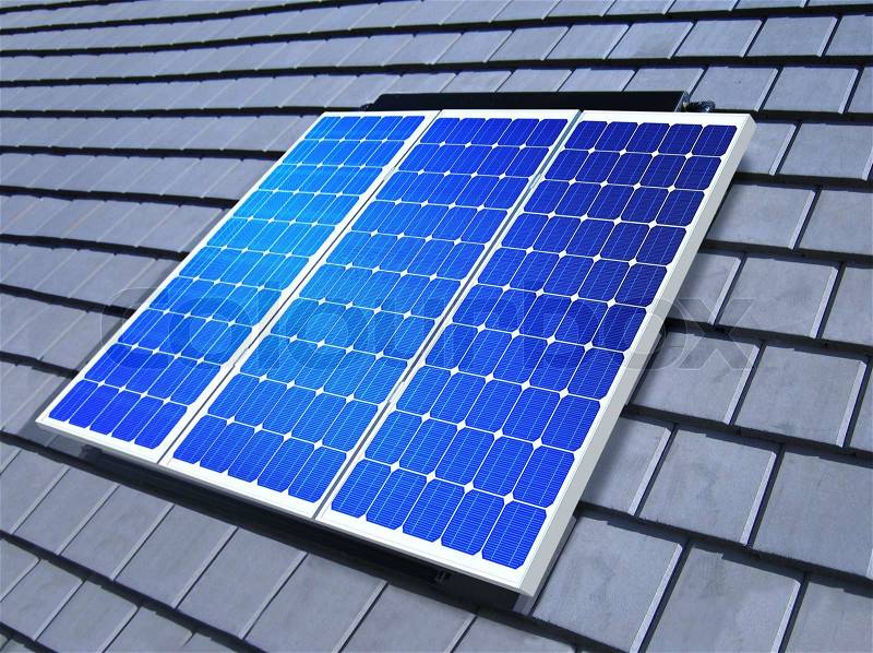 Solar-cell array on the roof of private home, stock photo