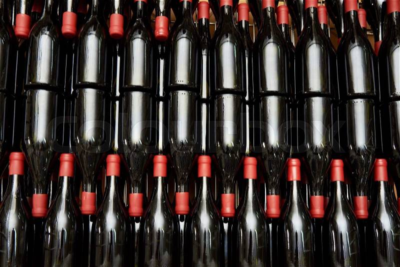 Wine bottles in factory close-up, stock photo