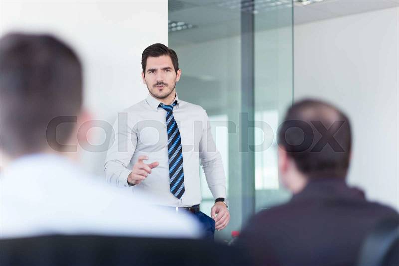 Team manager and business owner leading in-house business meeting. Business and entrepreneurship concept, stock photo