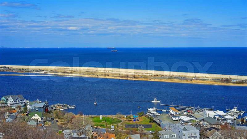 Houses and Atlantic Ocean shore viewed from light house at Sandy Hook. Sandy Hook is in New Jersey, USA, stock photo