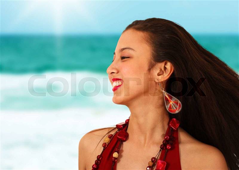 Relaxed Happy Girl On Vacation By The Sea In the Sunlight, stock photo