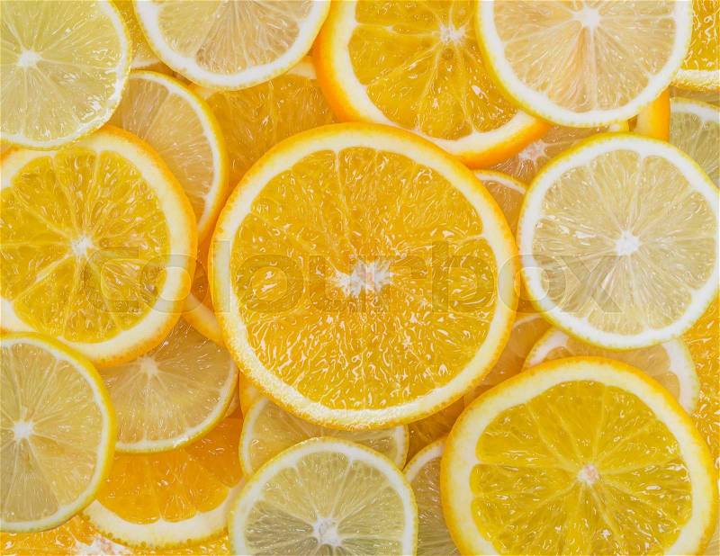 Fruit mix of lemon and orange fruit texture close-up, stock photo
