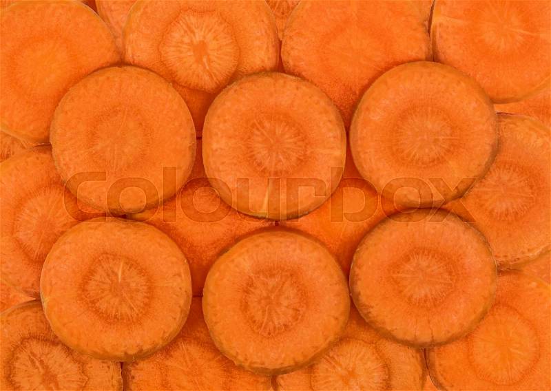 Sliced carrot discs. Background close up, stock photo