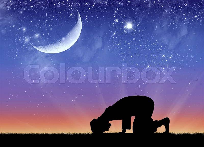Concept of Islamic culture. Silhouette of man praying at sunset, stock photo
