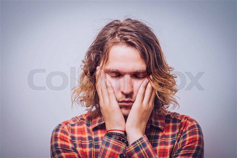 Exhausted sad man, stock photo