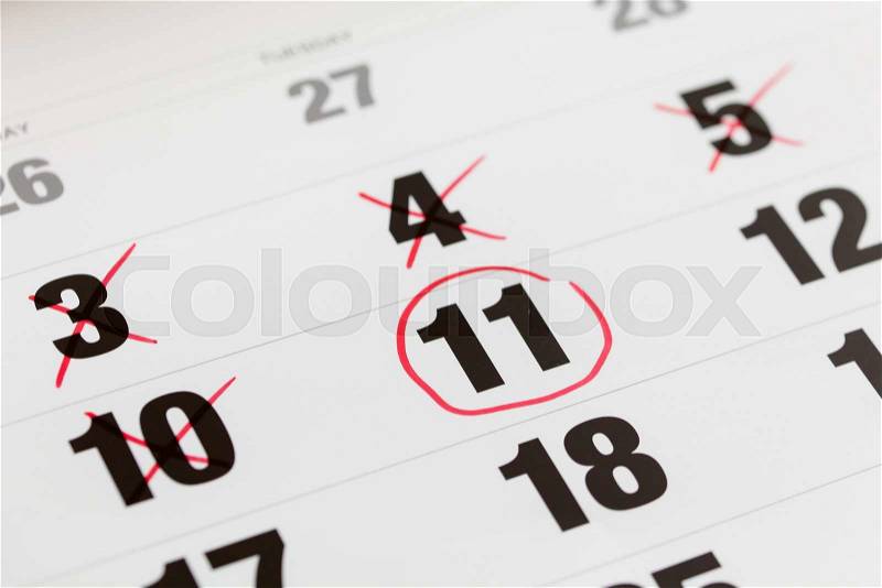 Red circle marked on a calendar and X Mark for counting down. concept for an important day, stock photo