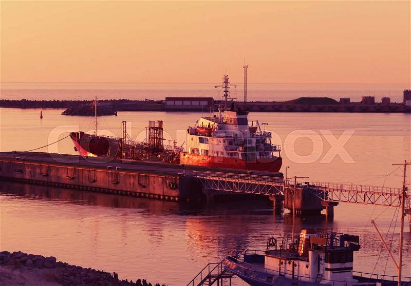 Dry dock at Marina in Ventspils at sunset. Ventspils a city in the Courland region of Latvia. Latvia is one of the Baltic countries, stock photo
