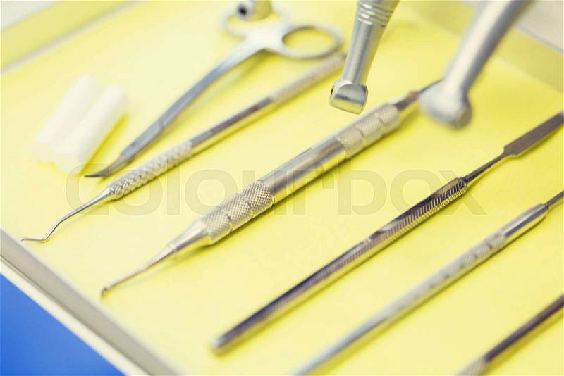 Dentistry, medicine, medical equipment and stomatology concept - close up of dental instruments, stock photo