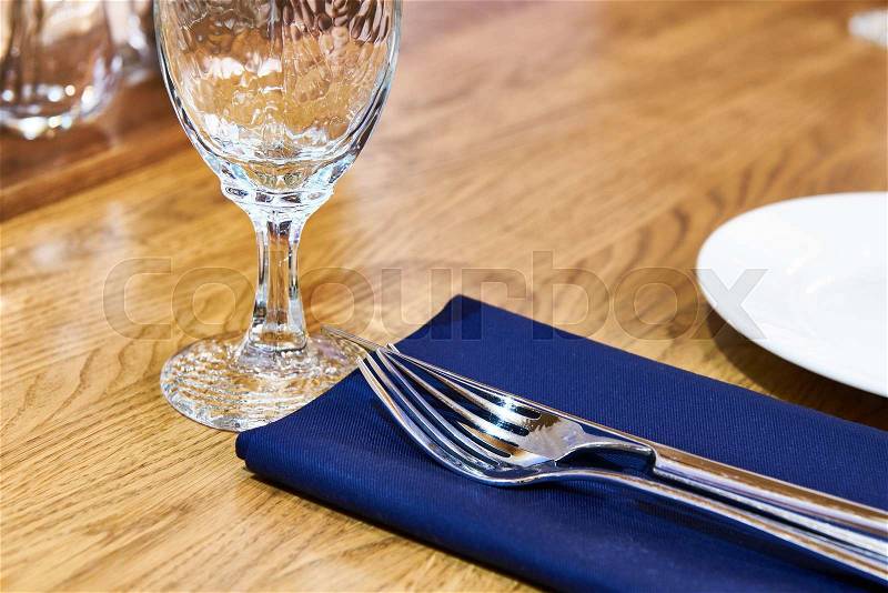 Serving dinner table in a restaurant, stock photo