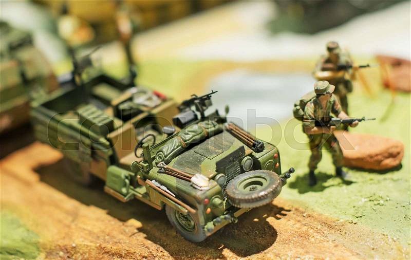 World in miniature. Military car model, stock photo