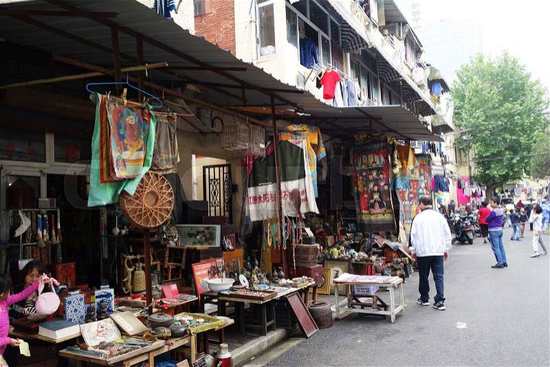 SHANGHAI, CHINA- JUN 04, 2016: Dongtai Lu Antique Market typical shops. The market is great for mementos and souvenirs of Shanghai, China , stock photo