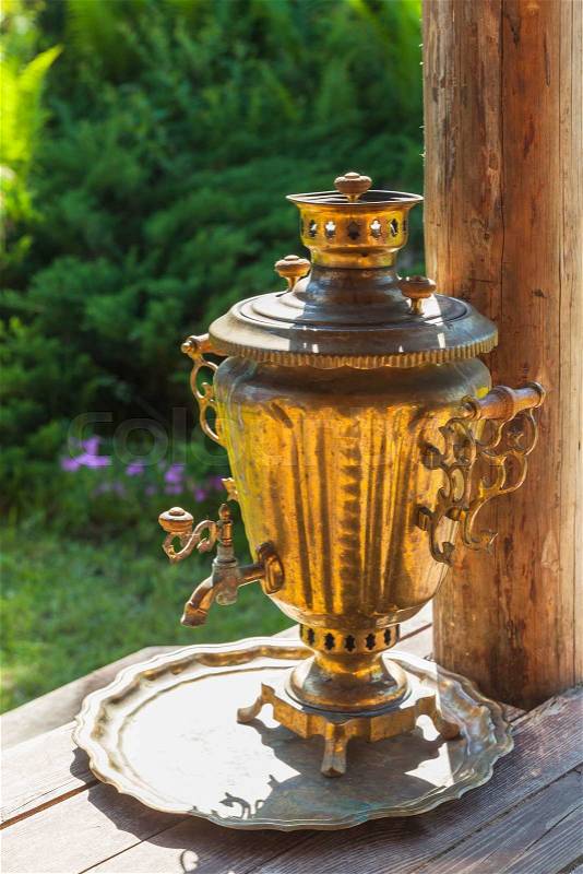 Traditional Russian Samovar, a metal container used to heat and boil water for tea ceremony, stock photo
