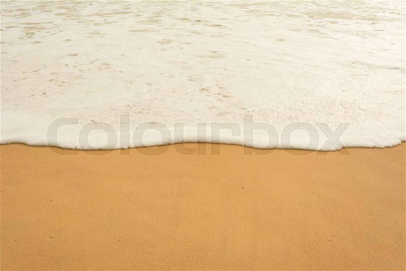 Sea wave and many foot print on the beach background, stock photo