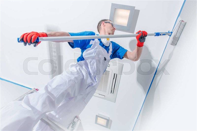 Interior Painting Business. Professional Room Painter at Work. Walls Painting, stock photo