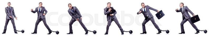 Businessman with shackles on white, stock photo