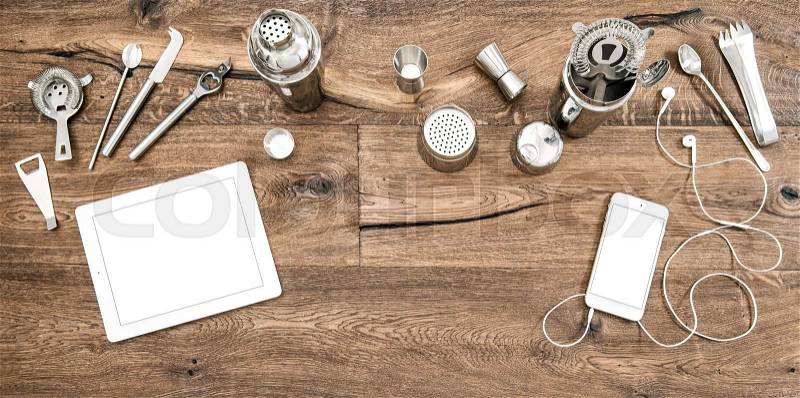 Bar counter with tools, accessories and electronic devices. Flat lay background, stock photo